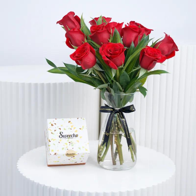 Beauty 11 Red Roses Vase With Chocolate - Gift Sets gift from Buy Any Flowers Dubai in Al Quoz Industrial Area 4, Dubai, UAE