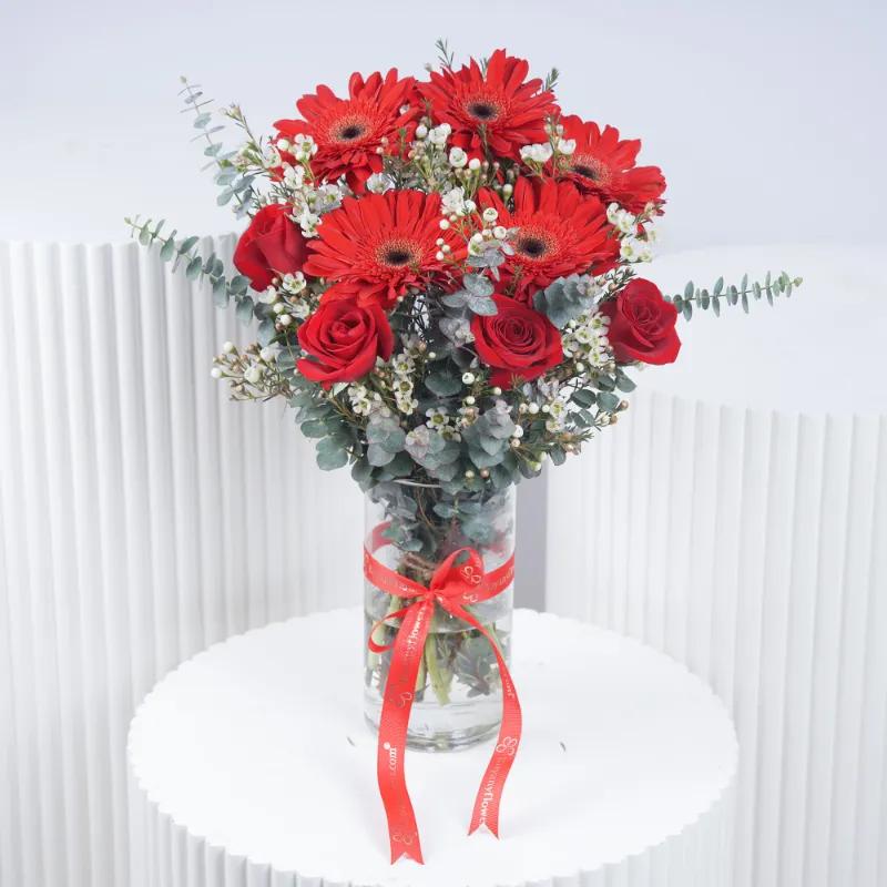 Crimson Gerbera and Roses in Vase - Flowers gift from Buy Any Flowers Dubai in Al Quoz Industrial Area 4, Dubai, UAE
