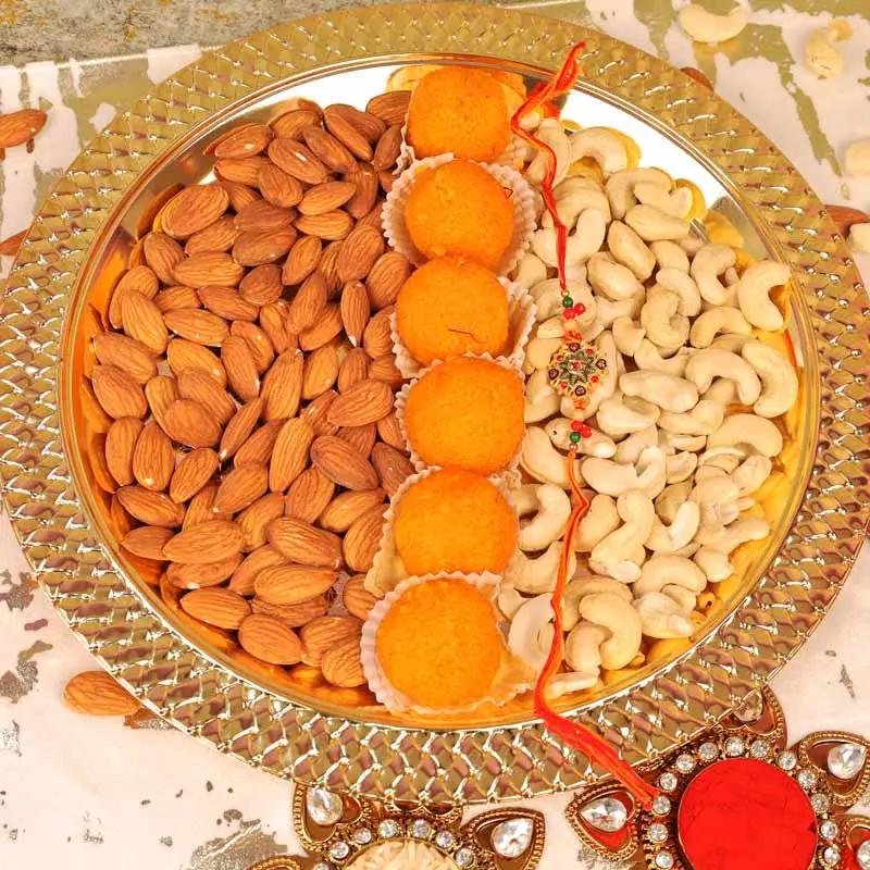 designer-rakhi-with-motichoor-laddoo-and-dry-fruit-thali_1.webp