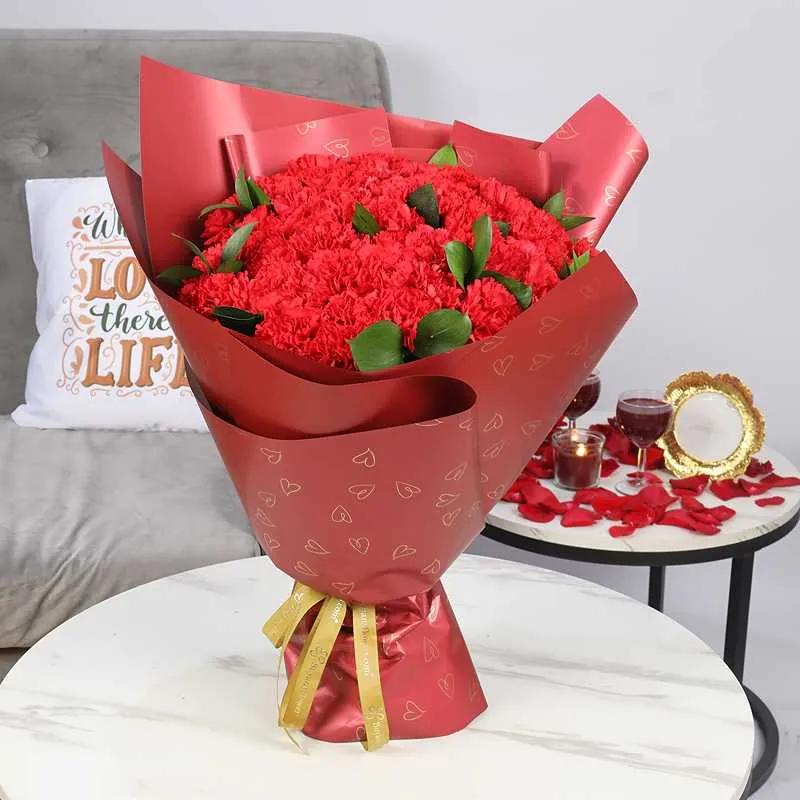 love51redcarnationsbouquet_d9f1b6.webp