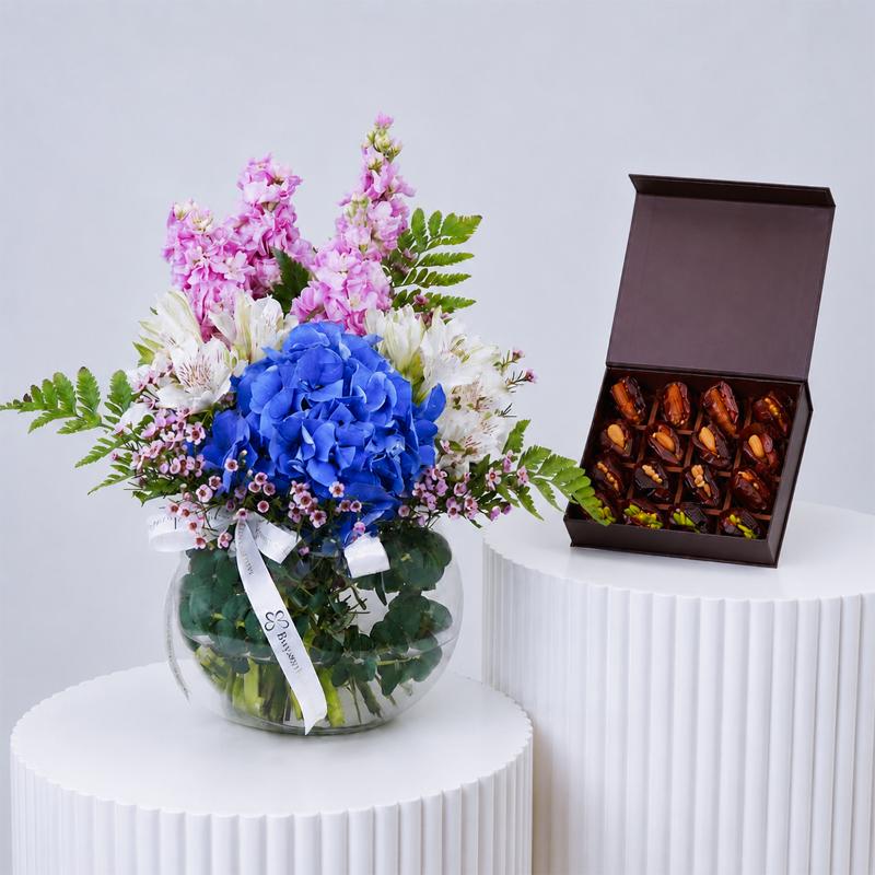 Blush Fish Bowl Flower and Dates - Gift Sets gift from Buy Any Flowers Dubai in Al Quoz Industrial Area 4, Dubai, UAE