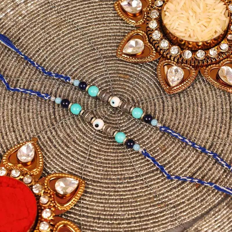 Evil Eye Rakhi Set of 2 - Gifts gift from Buy Any Flowers Dubai in Al Quoz Industrial Area 4, Dubai, UAE