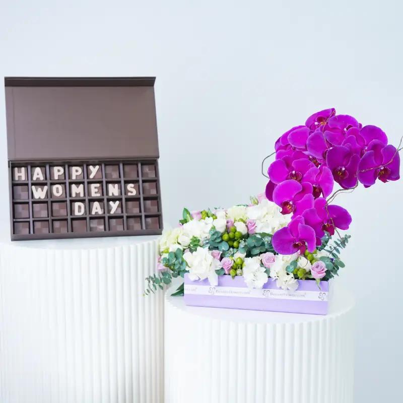 Pastel Flower in Purple Tray With Chocolate - Gift Sets gift from Buy Any Flowers Dubai in Al Quoz Industrial Area 4, Dubai, UAE