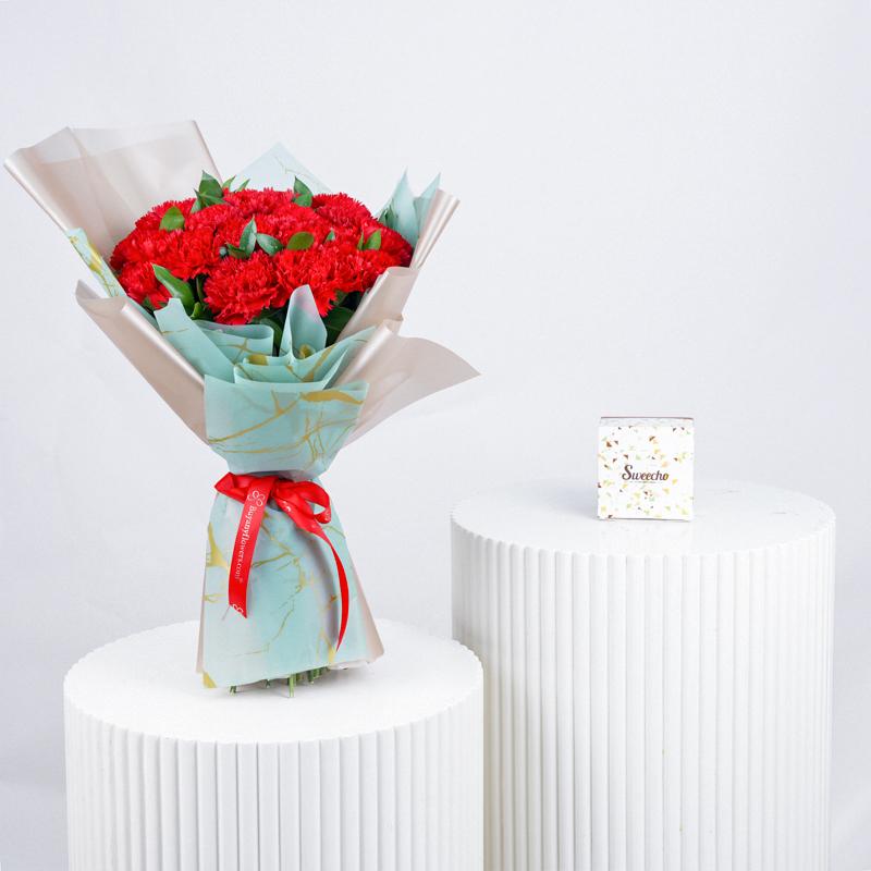 Love 21 Red Carnations Bouquet With chocolate - Gift Sets gift from Buy Any Flowers Dubai in Al Quoz Industrial Area 4, Dubai, UAE