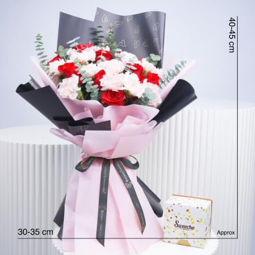 Queen 21 Red Roses and Pink Carnations Bouquet With Chocolates - Gift Sets gift from Buy Any Flowers Dubai in Al Quoz Industrial Area 4, Dubai, UAE - image 3