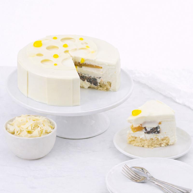 White Chocolate Mango Passion Fruit Praline Cake 4 Portion - Cakes gift from Buy Any Flowers Dubai in Al Quoz Industrial Area 4, Dubai, UAE - image 3