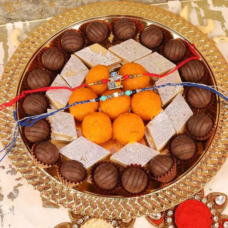 evil-eye-and-krishna-rakhi-with-sweets-and-chocolate-platter-set-of-2_1.webp