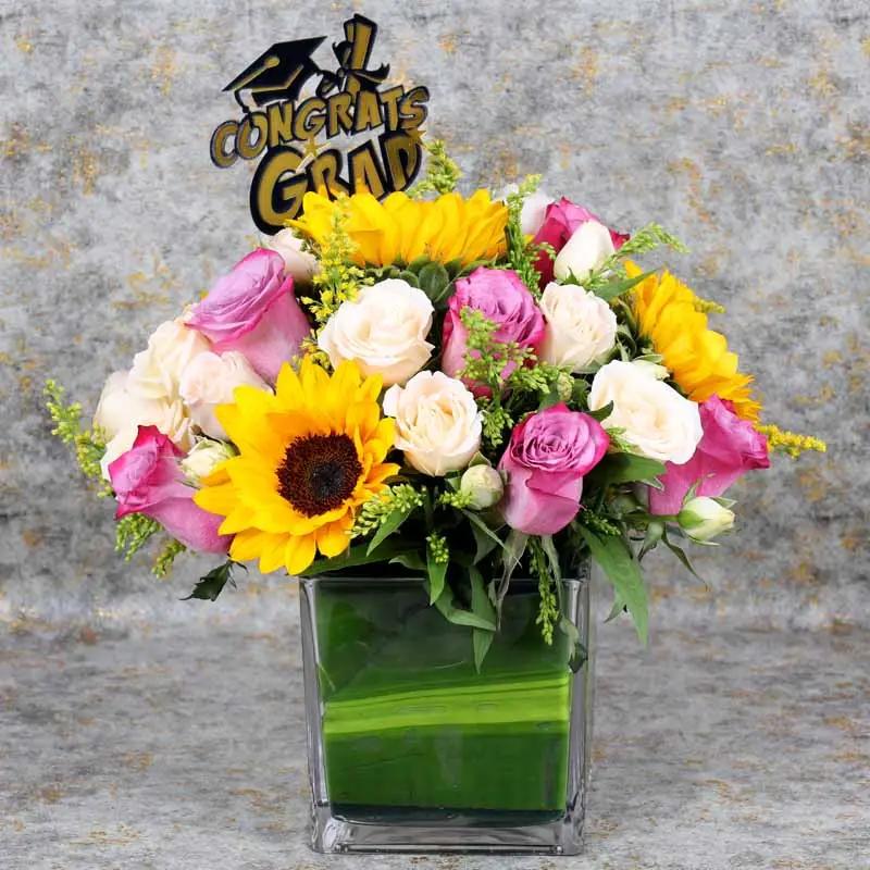 Congrats Grad Flower Vase - Flowers gift from Buy Any Flowers Dubai in Al Quoz Industrial Area 4, Dubai, UAE