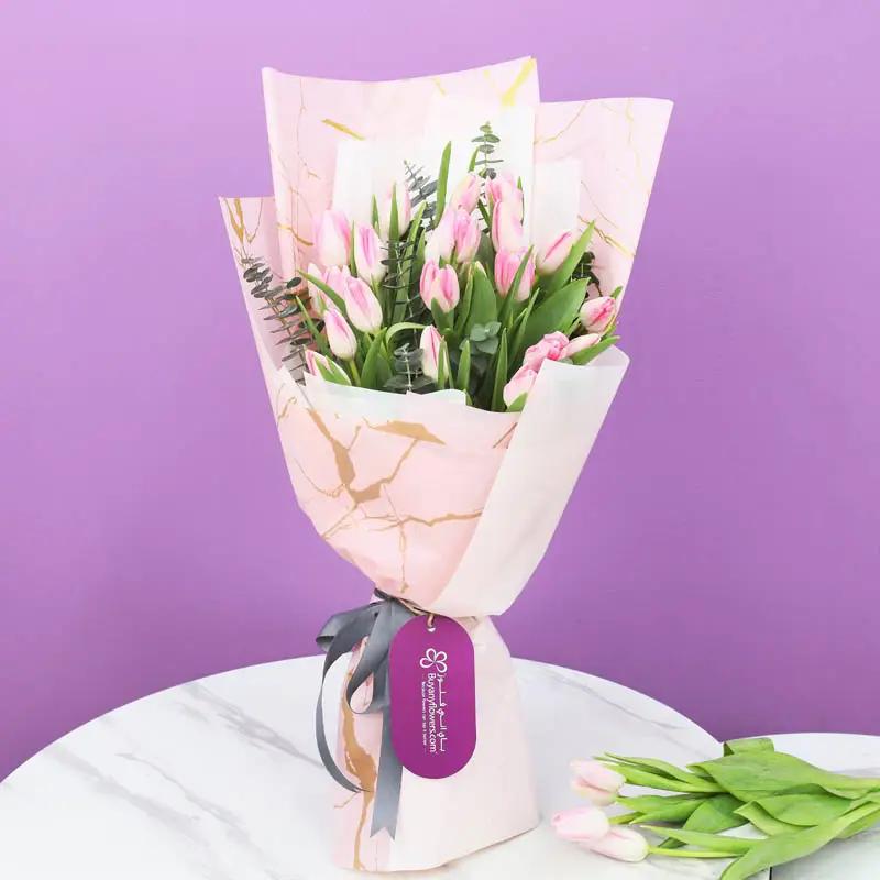 Delicate 21 Pink Tulips Bouquet in Dubai