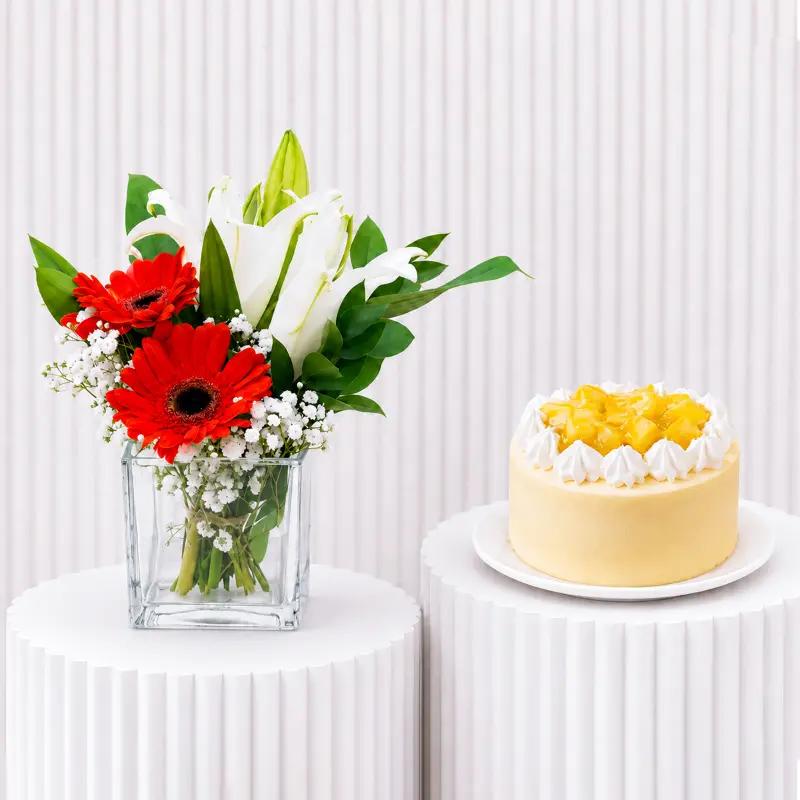 Scarlet Flower and Mango Mono Cake - Gift Sets gift from Buy Any Flowers Dubai in Al Quoz Industrial Area 4, Dubai, UAE