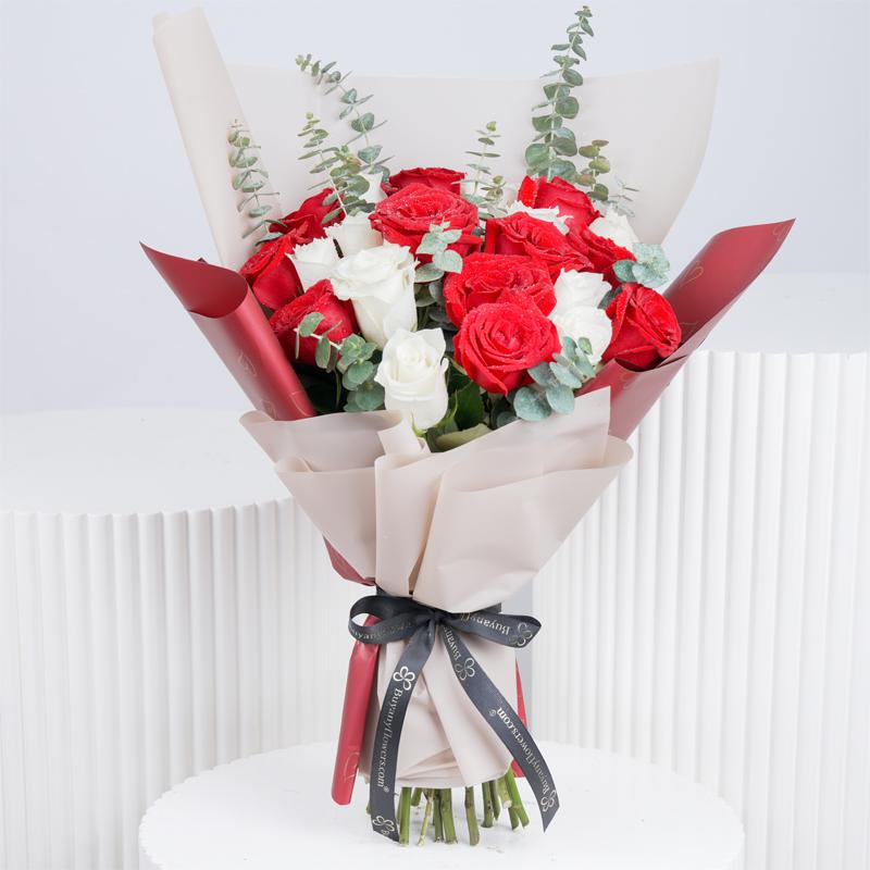Beauty in Red and White 21 Roses Bouquet in Dubai