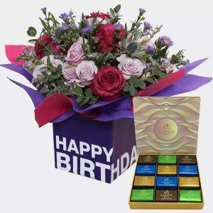 زهور تهاني عيد الميلاد مع شوكولاتة جوديفا نابس 1