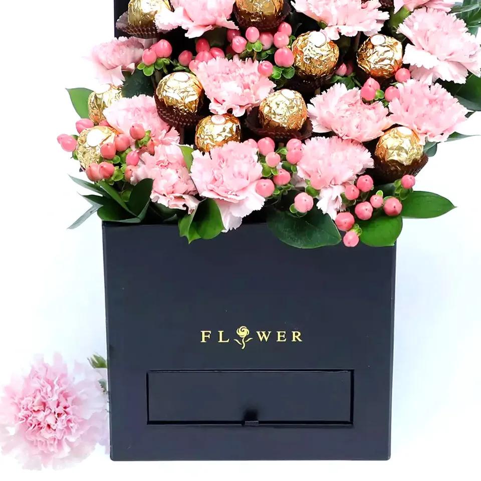 Pinky Garden Carnations and Ferrero Rocher Arrangement thumbnail 2