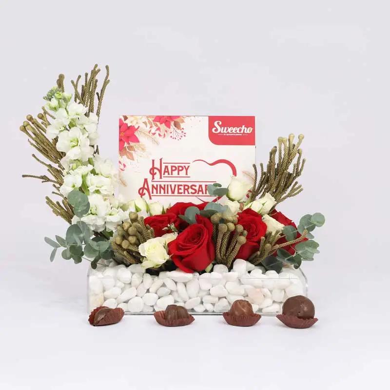 love-flowers-and-aniiversary-chocolates-arrangement_1.webp
