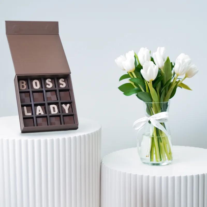 Calm 11 White Tulips With Chocolate - Flowers gift from Buy Any Flowers Dubai in Al Quoz Industrial Area 4, Dubai, UAE