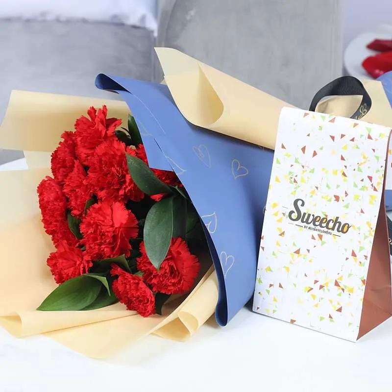 Love 11 Red Carnations Bouquet and Sweecho Chocolates 100gm thumbnail 2