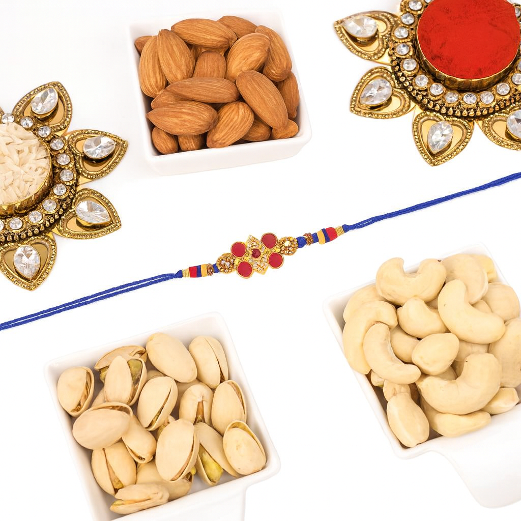 designerkundanrakhiwithdryfruits_554a7b.png