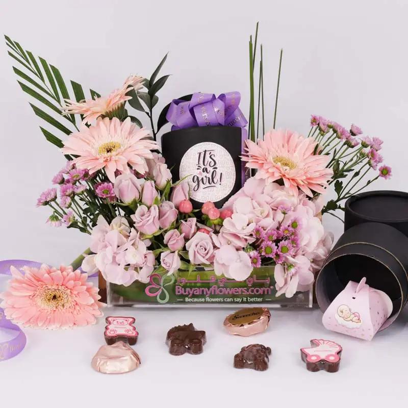 its-a-girl-flowers-and-chocolate-arrangement_1.webp