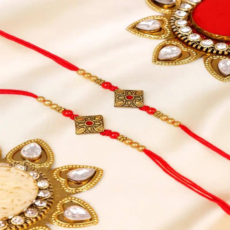 Antique Kundan Rakhi Set of 2 in Dubai