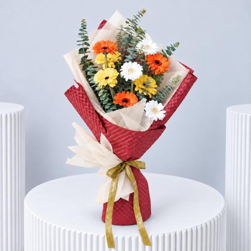 Glow 9 Gerberas Bouquet - Flowers gift from Buy Any Flowers Dubai in Al Quoz Industrial Area 4, Dubai, UAE