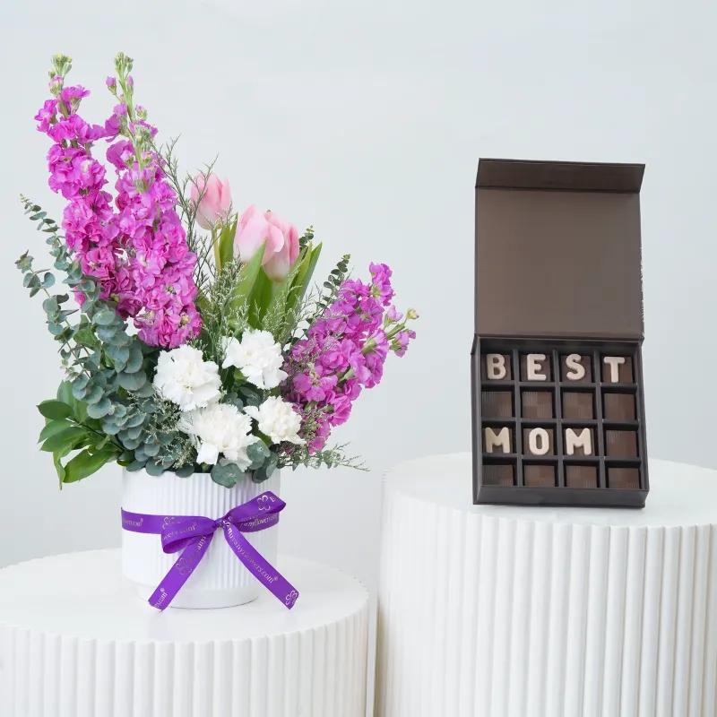 Pastel Bloom Ceramic Arrangement With Chocolate - Gift Sets gift from Buy Any Flowers Dubai in Al Quoz Industrial Area 4, Dubai, UAE
