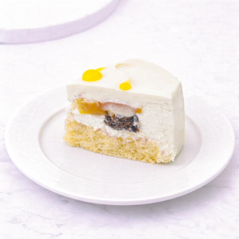 White Chocolate Mango Passion Fruit Praline Cake 4 Portion - Cakes gift from Buy Any Flowers Dubai in Al Quoz Industrial Area 4, Dubai, UAE - image 4