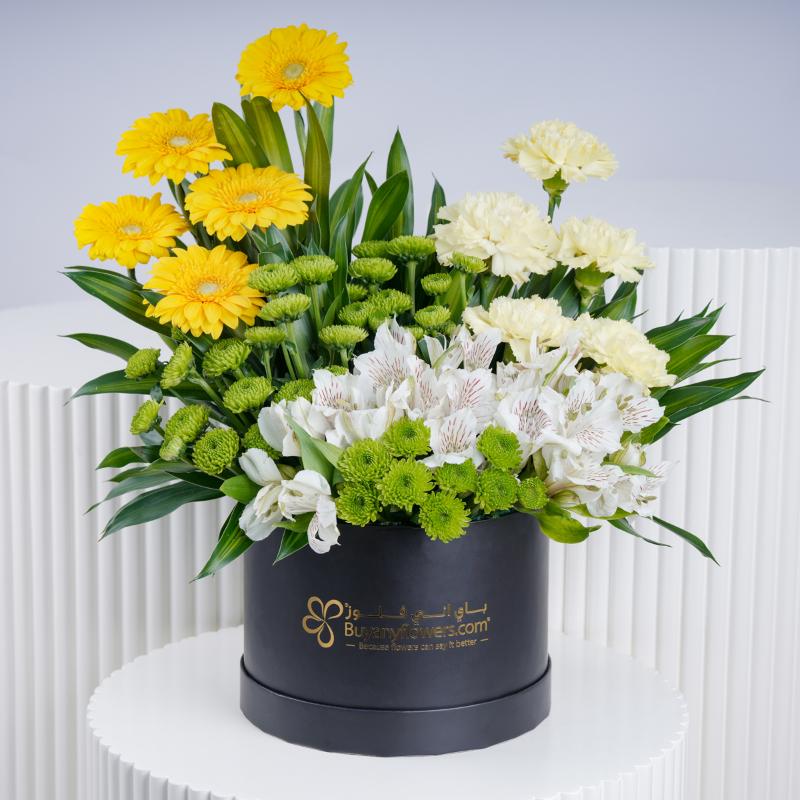 Sunshine Charm Round Box - Flowers gift from Buy Any Flowers Dubai in Al Quoz Industrial Area 4, Dubai, UAE