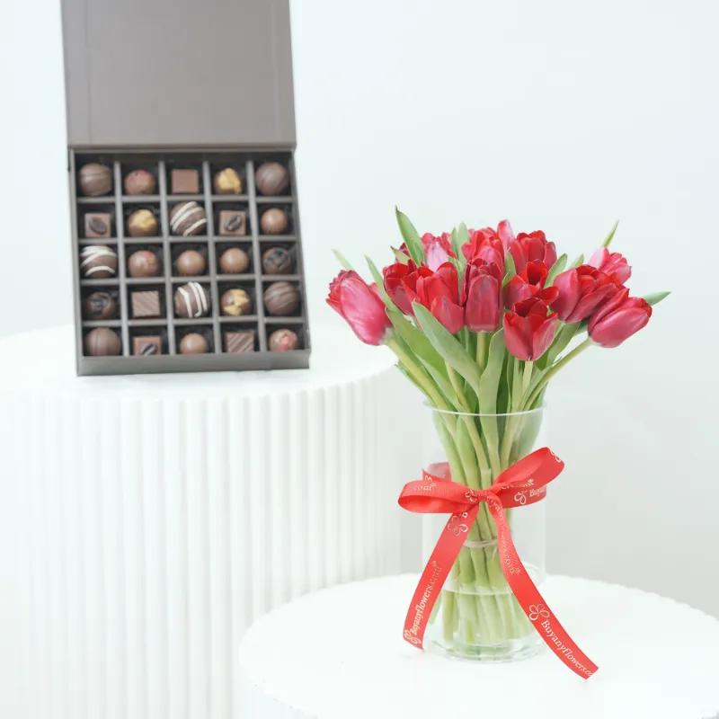 Love 21 Red Tulips Vase With Chocolate - Gift Sets gift from Buy Any Flowers Dubai in Al Quoz Industrial Area 4, Dubai, UAE