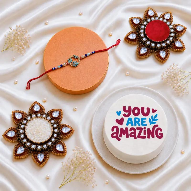 Blue Flower Stone Rakhi With You are Amazing Bento Cake - Gifts gift from Buy Any Flowers Dubai in Al Quoz Industrial Area 4, Dubai, UAE