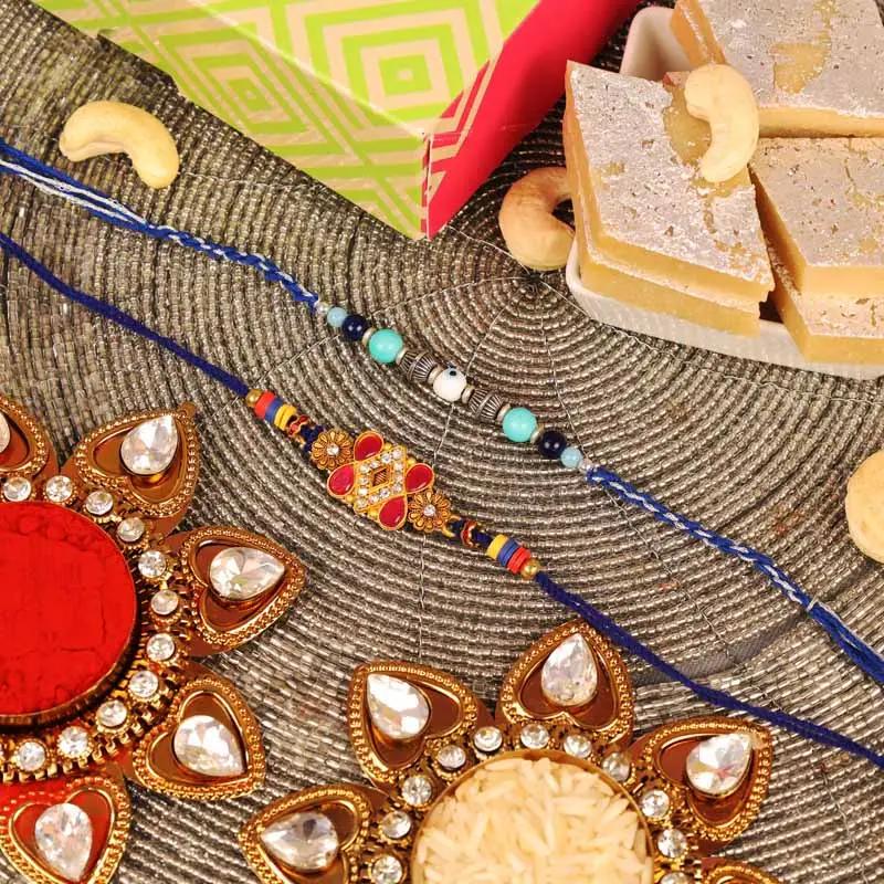 evil-eye-and-kundan-rakhi-with-kaju-katli-set-of-2_1.webp
