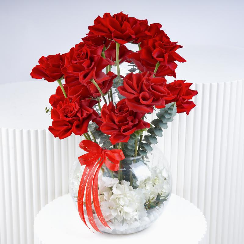 Scarlet Blooms in Fish Bowl - Flowers gift from Buy Any Flowers Dubai in Al Quoz Industrial Area 4, Dubai, UAE