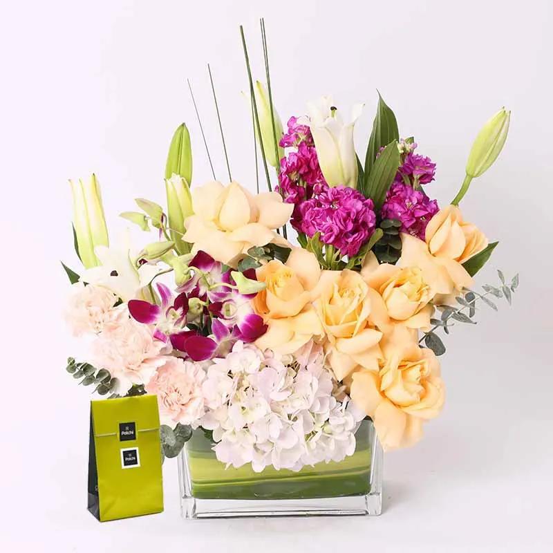 Tender Floral Arrangement and Deluxe Patchi Chocolates thumbnail 1