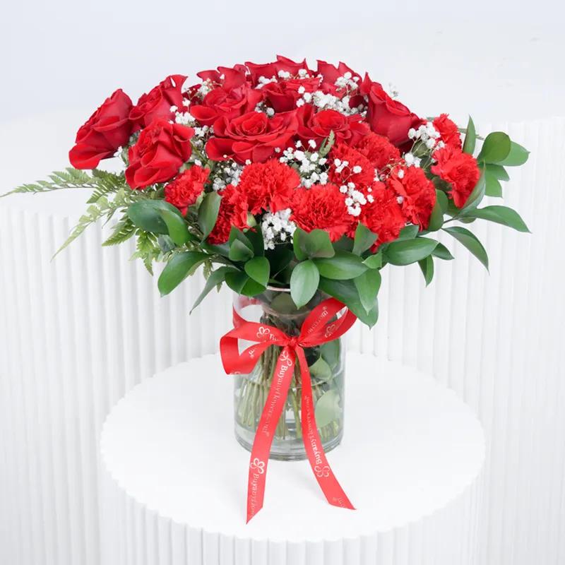 Love 21 Red Roses and Carnations in Vase - Flowers gift from Buy Any Flowers Dubai in Al Quoz Industrial Area 4, Dubai, UAE
