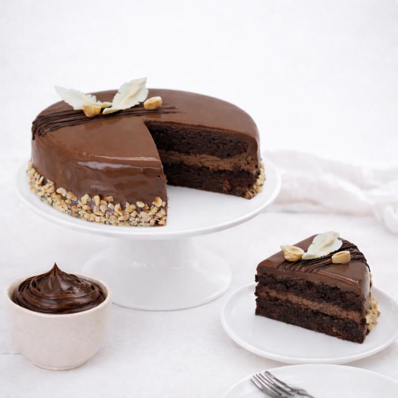 Yummy Chocolate Hazelnut Cake 4 Portion - Cakes gift from Buy Any Flowers Dubai in Al Quoz Industrial Area 4, Dubai, UAE - image 2