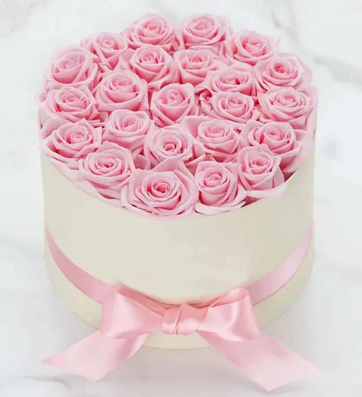 pink-roses-in-white-round-box_1.webp