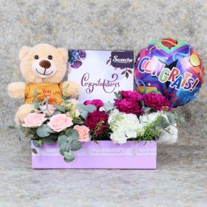 mauve-congrats-flower-hamper_1.webp