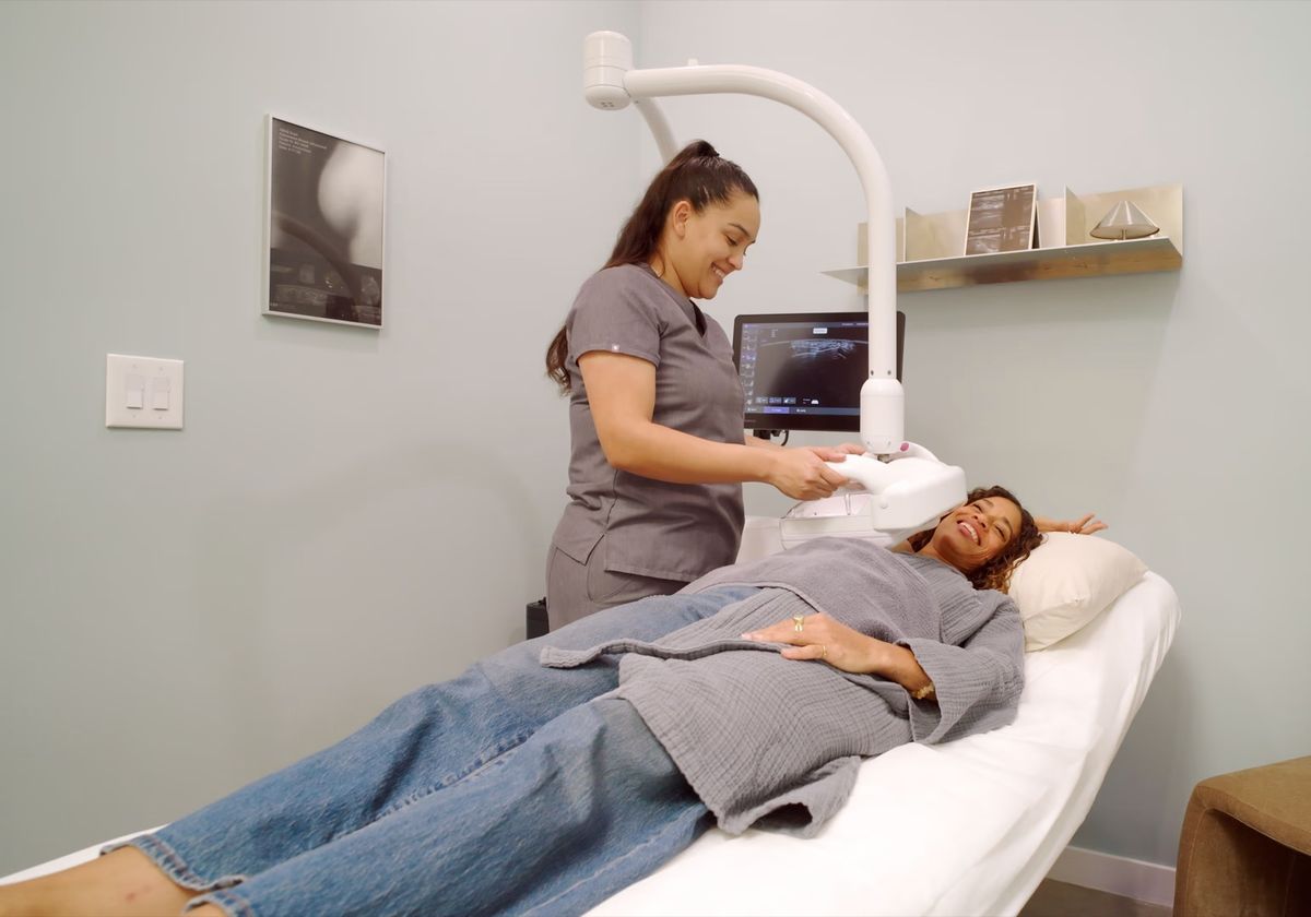 A patient relaxing during an automated breast ultrasound scan