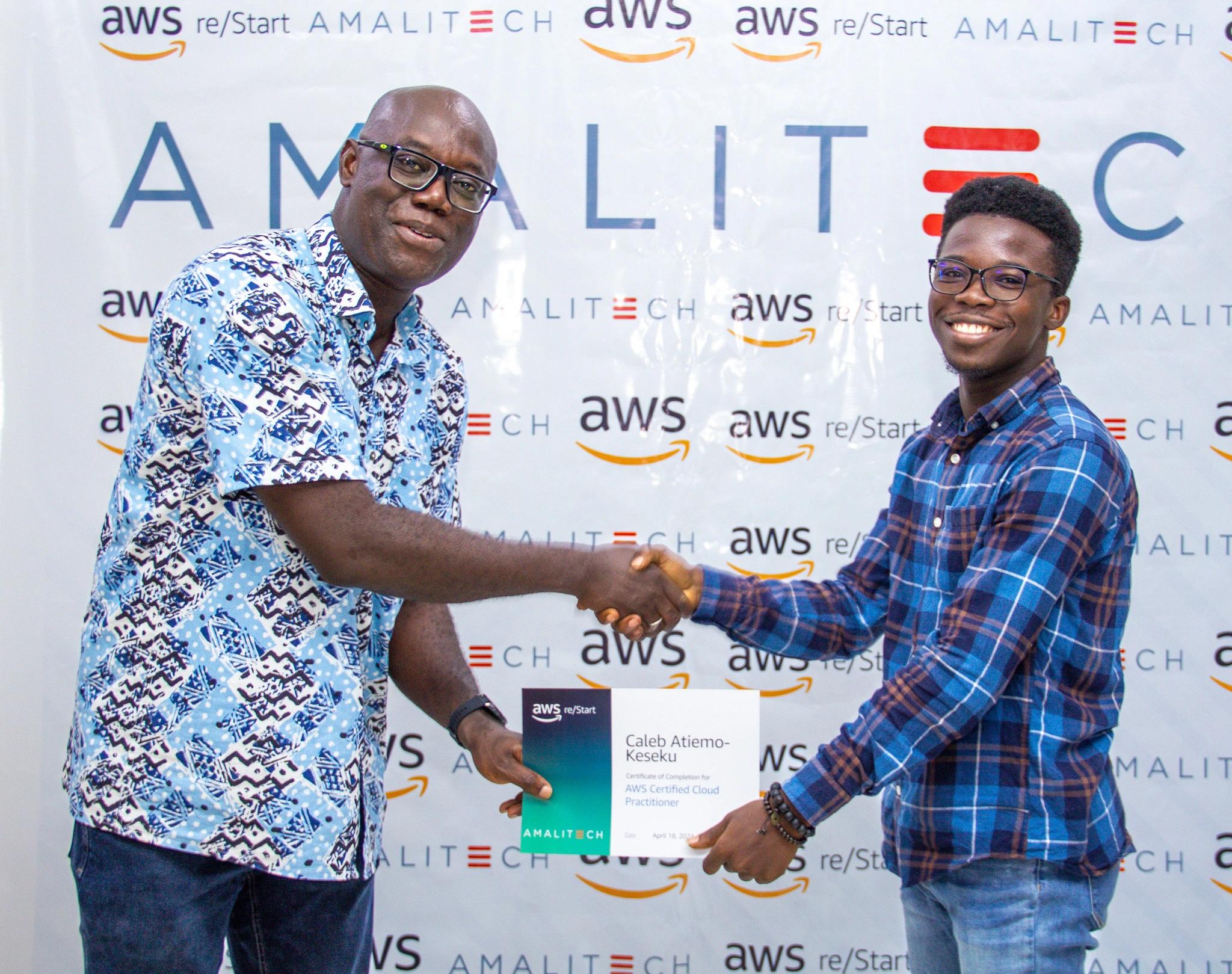 Our Senior Principal awarding a developer his AWS/Restart Programme certificate.