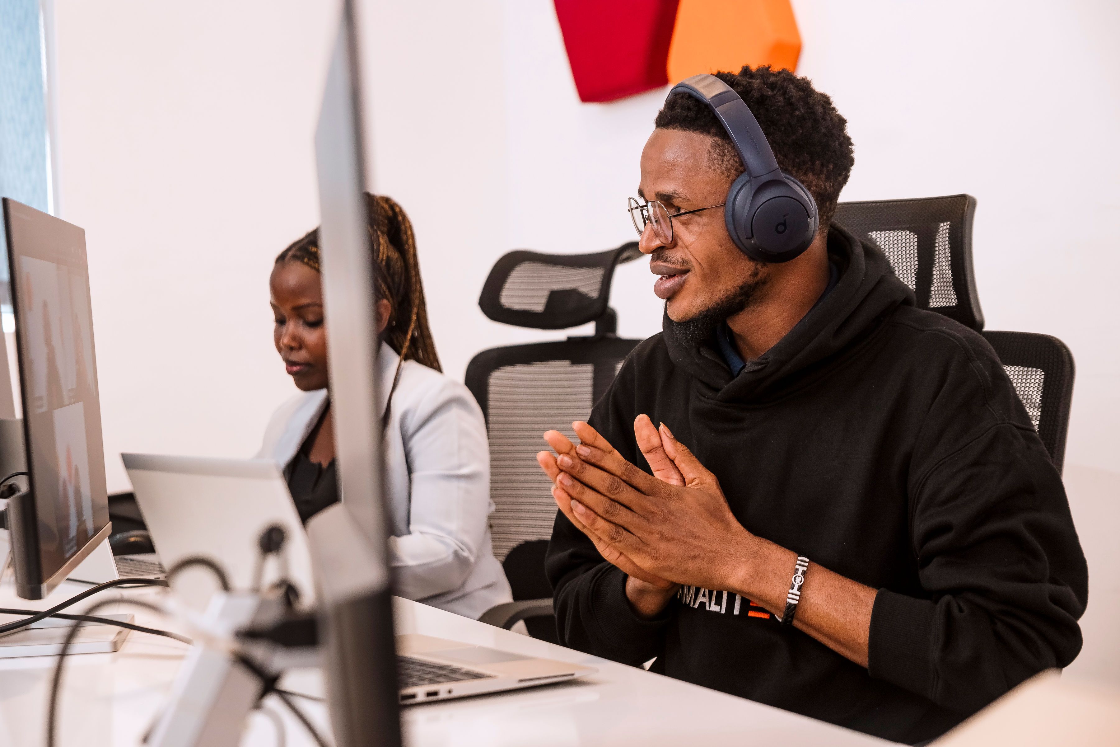 A developer taking part in a virtual meeting