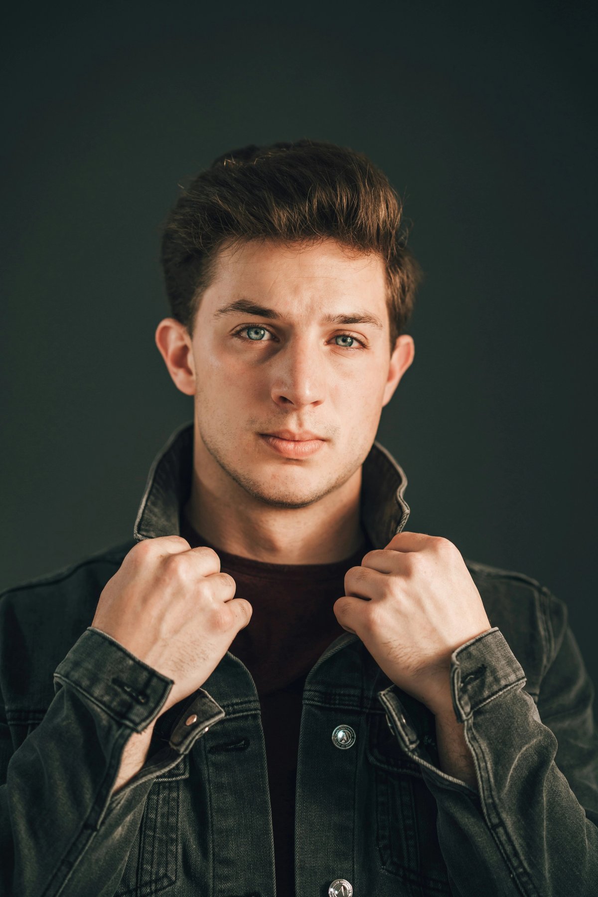 a photo of male modal wearing leather jacket