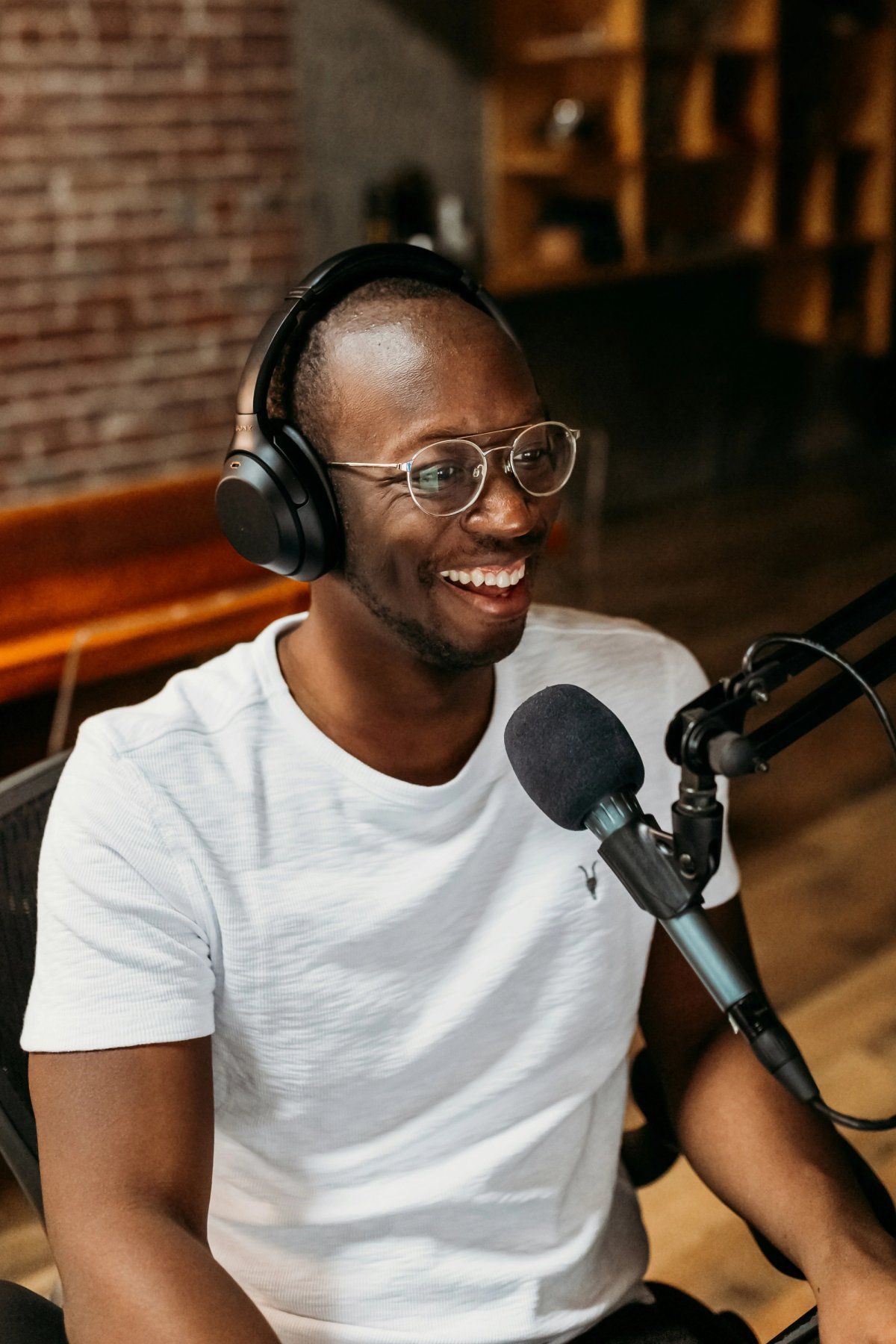 a photo of man in the podcast studio