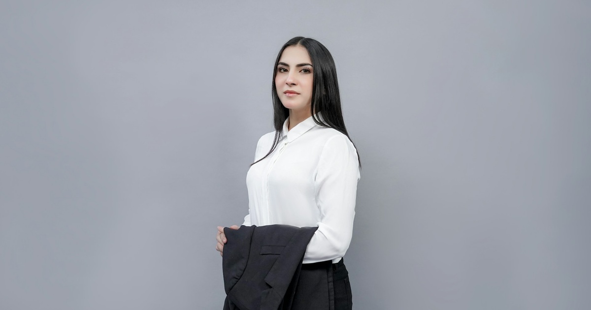 professional female lawyer headshot against white background