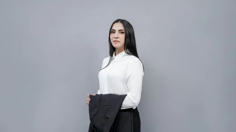professional female lawyer headshot against white background
