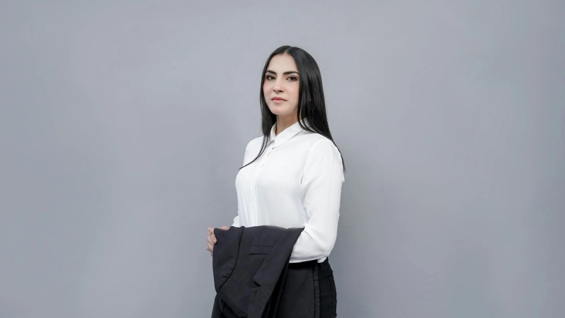 professional female lawyer headshot against white background