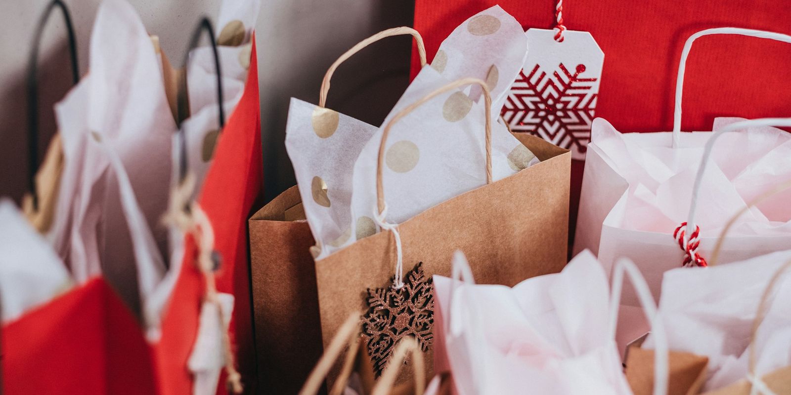 Shopping bags held close up, for Amazon Australia sale events