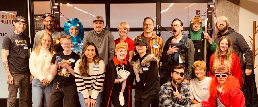 Big Sproutbox team group photo in Halloween costumes with name tags