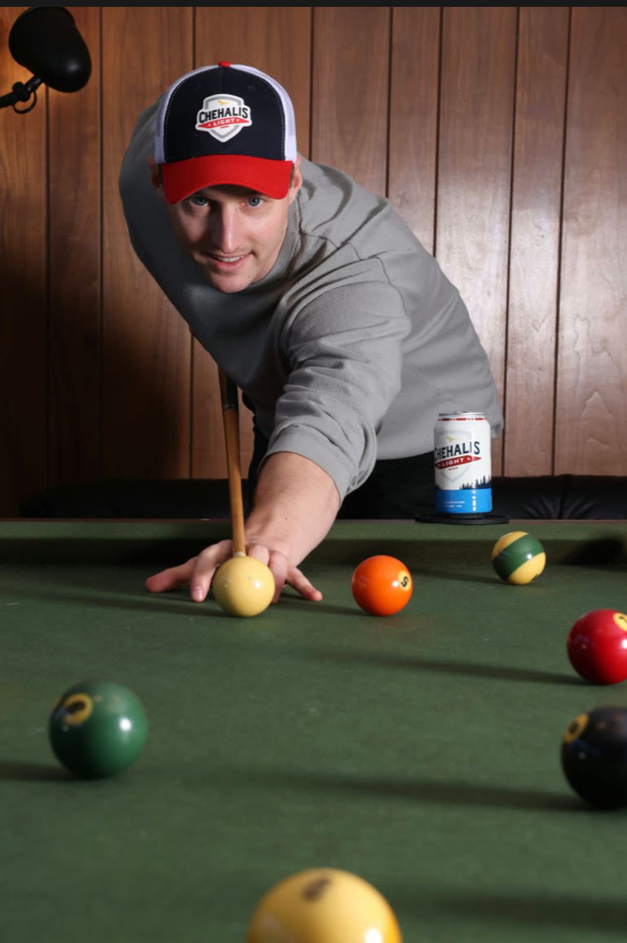 Sproutbox teammate lining up a pool shot