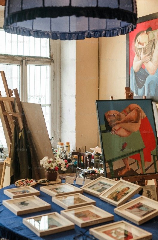Works of art set on a table and the artist's space