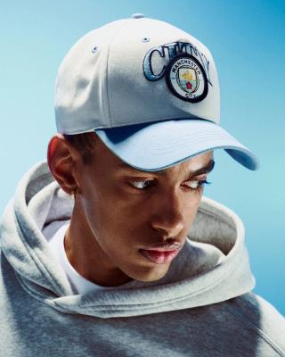 Manchester City F.C. Graphic Baseball Hat. Photo via Hollister.