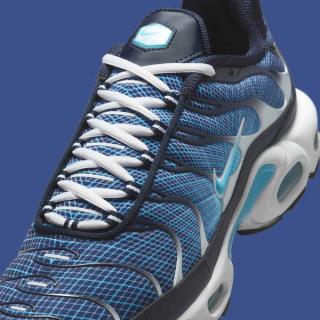 Close-up view of Nike's Air Max Plus featuring a "Blue Chill" grid pattern across the upper.